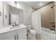 This is a modern bathroom featuring tile surround and a vanity at 4011 Tundra Rd, Charlotte, NC 28203