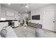 This is another angle of the living room, featuring a wet bar at 4011 Tundra Rd, Charlotte, NC 28203
