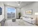 This living room features a sliding door to the outside and hardwood flooring at 4011 Tundra Rd, Charlotte, NC 28203