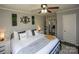 Comfortable bedroom with modern decor and ceiling fan at 407 Orchard Ln, Belmont, NC 28012