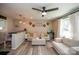 Open concept living room with modern decor and comfortable seating at 407 Orchard Ln, Belmont, NC 28012