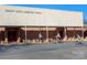 Belmont Central Elementary School building exterior with children riding bikes in front of the entrance at 407 Orchard Ln, Belmont, NC 28012