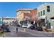 A charming streetscape features a variety of local shops and restaurants in a vibrant downtown setting at 407 Orchard Ln, Belmont, NC 28012