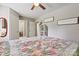 Cozy bedroom with ceiling fan, decor, and patterned bedspread at 413 Picadilly Ln, Troutman, NC 28166
