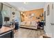 Relaxing living room with couch, desk, shelves, and natural light at 413 Picadilly Ln, Troutman, NC 28166