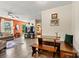 Bright and airy living room featuring wood floors, stylish furniture, and access to the backyard at 413 Picadilly Ln, Troutman, NC 28166