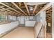 A view of the unfinished basement at 417 S Broad St, Gastonia, NC 28052