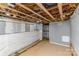 A view of the unfinished basement with open ceiling at 417 S Broad St, Gastonia, NC 28052