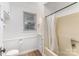 Clean, compact bathroom features shower and tub combination at 417 S Broad St, Gastonia, NC 28052