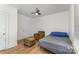 Light bedroom featuring new flooring, chair and a single bed at 417 S Broad St, Gastonia, NC 28052