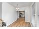 Dining area showcasing hardwood floors and view to kitchen at 417 S Broad St, Gastonia, NC 28052