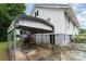 A view of the side of the house with a metal awning at 417 S Broad St, Gastonia, NC 28052