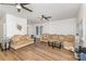 Spacious living room with hardwood floors and comfortable, neutral-toned furniture at 417 S Broad St, Gastonia, NC 28052