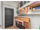 A storage area with shelves stocked with paper towels and large boxes of appliances at 417 S Broad St, Gastonia, NC 28052