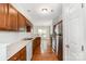 Bright kitchen featuring white countertops, wood cabinets, and stainless-steel appliances at 4213 Coulter Xing, Charlotte, NC 28213