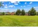Expansive backyard with a wooden play set and trampoline, perfect for outdoor activities and Gathering fun at 4336 Hunter Rhyne Rd # 9, Lincolnton, NC 28092