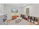 bedroom featuring a large window for natural lighting, and hardwood flooring at 4336 Hunter Rhyne Rd # 9, Lincolnton, NC 28092