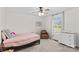 Bedroom featuring a comfortable single bed, dark-toned hardwood furniture, and a window with natural light at 4336 Hunter Rhyne Rd # 9, Lincolnton, NC 28092