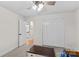 Bedroom view showcases a double door closet, a window, and an open doorway to the en suite bathroom at 4336 Hunter Rhyne Rd # 9, Lincolnton, NC 28092