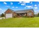 Charming single-story brick home with a well-manicured lawn and a two-car garage at 4336 Hunter Rhyne Rd # 9, Lincolnton, NC 28092