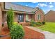 Inviting front porch with rocking chair, swing, and lush landscaping, adding to curb appeal at 4336 Hunter Rhyne Rd # 9, Lincolnton, NC 28092