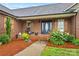 Inviting front porch with rocking chair, swing, and lush landscaping, providing curb appeal at 4336 Hunter Rhyne Rd # 9, Lincolnton, NC 28092