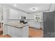 Bright kitchen features granite countertops, stainless steel appliances, and white subway tile backsplash at 4336 Hunter Rhyne Rd # 9, Lincolnton, NC 28092