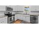 Bright kitchen featuring granite countertops, stainless steel appliances, and a subway tile backsplash at 4336 Hunter Rhyne Rd # 9, Lincolnton, NC 28092