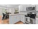 Kitchen with white cabinets, stainless steel appliances, granite countertops, and an adjacent dining area at 4336 Hunter Rhyne Rd # 9, Lincolnton, NC 28092