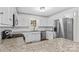 Bright kitchen featuring granite countertops, stainless steel appliances, and a subway tile backsplash at 4336 Hunter Rhyne Rd # 9, Lincolnton, NC 28092