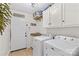 Laundry room featuring a utility sink, tan granite countertop, and white washer and dryer at 4336 Hunter Rhyne Rd # 9, Lincolnton, NC 28092
