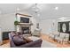 Spacious living room with vaulted ceilings, stone fireplace, hardwood floors, and ample natural light at 4336 Hunter Rhyne Rd # 9, Lincolnton, NC 28092