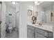 Bathroom featuring a modern vanity, mirror, and tile flooring at 4842 Durneigh Dr, Kannapolis, NC 28081