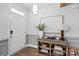 Bright foyer with elegant wallpaper, modern lighting, and stylish console table at 4842 Durneigh Dr, Kannapolis, NC 28081