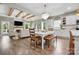Open concept kitchen and living area with wood beams, seamlessly connecting spaces at 4842 Durneigh Dr, Kannapolis, NC 28081