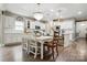 Spacious open concept kitchen with stylish island, seamlessly flowing into dining area at 4842 Durneigh Dr, Kannapolis, NC 28081