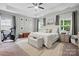 Bright main bedroom features a tray ceiling, large windows and a well-appointed layout at 4842 Durneigh Dr, Kannapolis, NC 28081