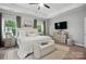 Inviting main bedroom features a tray ceiling, large windows and a well-appointed layout at 4842 Durneigh Dr, Kannapolis, NC 28081