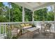 Covered porch featuring comfortable seating and a ceiling fan, perfect for relaxing outdoors at 4842 Durneigh Dr, Kannapolis, NC 28081
