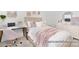 Bedroom featuring a bed with pink accents, study desk and dresser with decor at 499 Switch St # 128, York, SC 29745