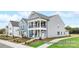 Stylish two-story home with a covered porch and well-manicured lawn at 499 Switch St # 128, York, SC 29745