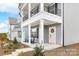 Inviting front porch with rocking chairs and a welcoming entrance at 499 Switch St # 128, York, SC 29745