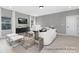 Cozy living room with paneled walls, modern decor, and ample natural light at 499 Switch St # 128, York, SC 29745
