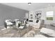 Relaxing living room featuring stylish furniture, a modern rug, and plenty of natural light at 499 Switch St # 128, York, SC 29745