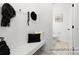 Functional mudroom with bench seating, hooks, and convenient access to the powder room at 499 Switch St # 128, York, SC 29745