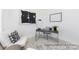 Contemporary home office setup with a sleek desk, comfortable seating, and minimalist decor at 499 Switch St # 128, York, SC 29745