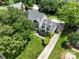 Aerial view of the home, showcasing the beautifully landscaped yard and surrounding neighborhood at 503 New Castle Ne Ct, Concord, NC 28025