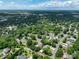 Overhead view showcasing a mix of homes and lush greenery, nestled in a serene neighborhood at 503 New Castle Ne Ct, Concord, NC 28025