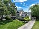 Beautiful two-story home with a well-manicured lawn, mature trees, and charming curb appeal at 503 New Castle Ne Ct, Concord, NC 28025