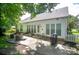 Relaxing backyard patio with comfortable seating and a grill, perfect for outdoor entertaining at 6009 Swanston Dr, Charlotte, NC 28269